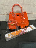 Sunmi 20cm evening bag, made with Togo leather.